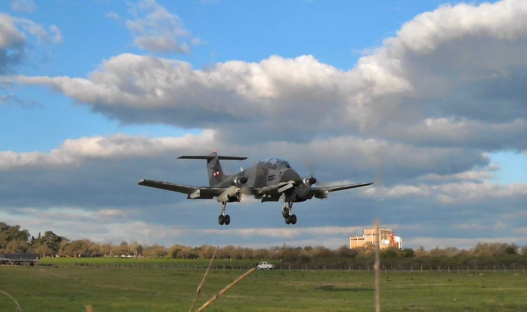 Short/soft field takeoff! Two Pucará operating out of unprepared field in Uruguay. (Image Manolo Doval)