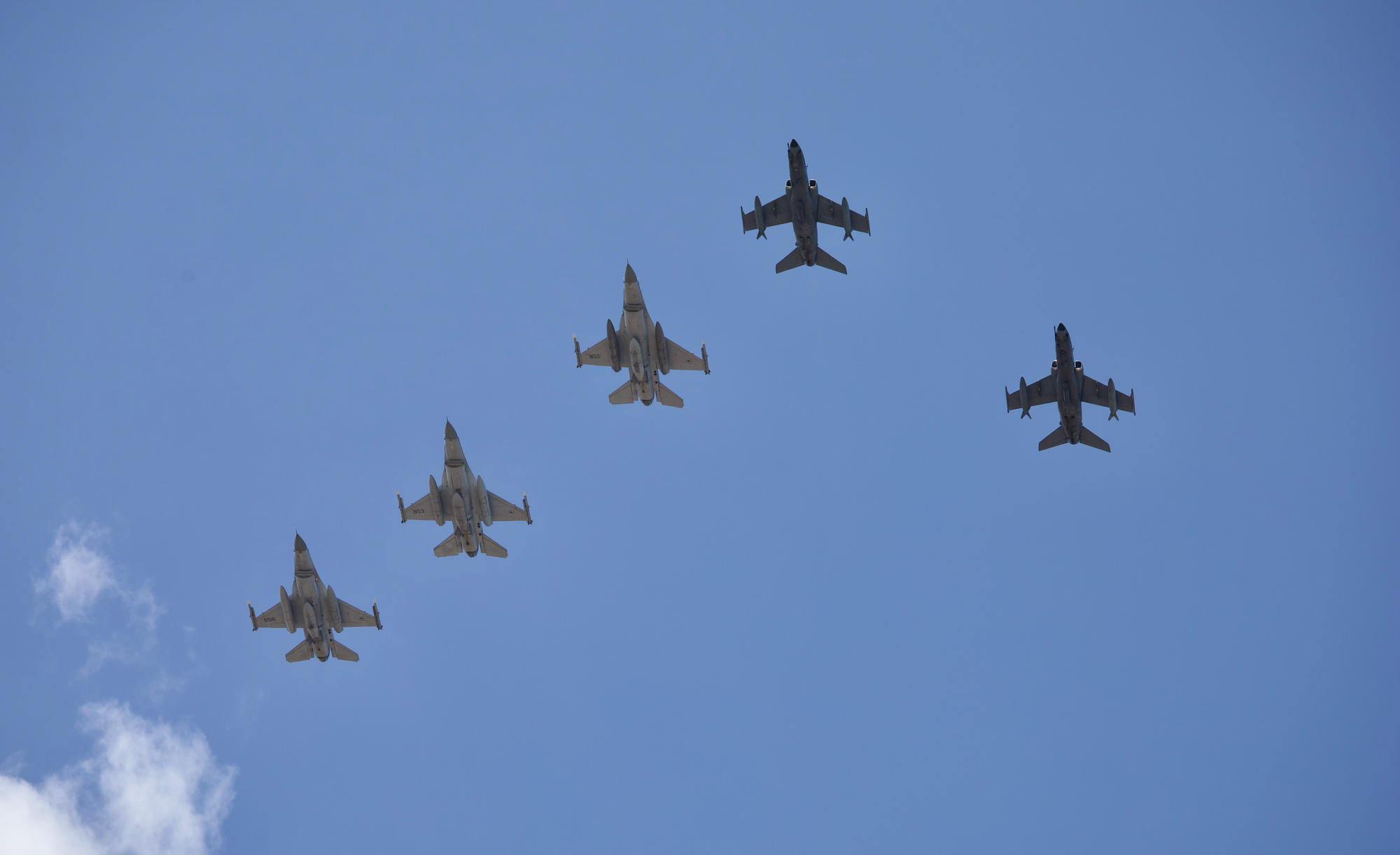 Two FAB A-1As (AMX) lead back home a formation of three FaCh F-16s during the initial FAM week at CRUZEX 2024